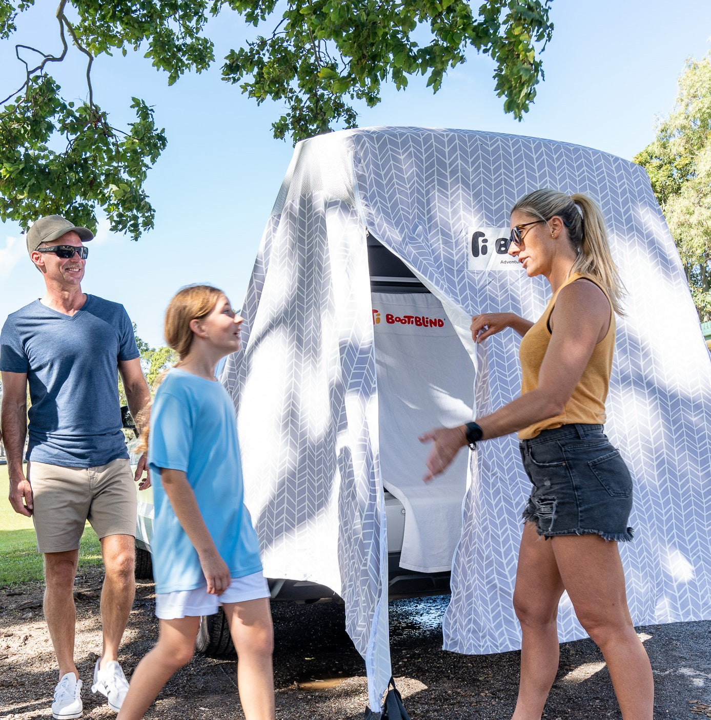 family with tent at sport